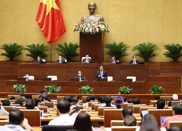 Bộ trưởng Lê Minh Hoan giải trình ý kiến đại biểu Quốc hội nêu. (Ảnh: Dương Giang/TTXVN) Tạo nên tảng để nông dân là chủ thể trong xây dựng nông thôn mới ảnh 2