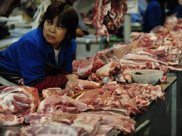 Trung Quốc mua tạm trữ thịt lợn hỗ trợ ngành chăn nuôi ảnh 1