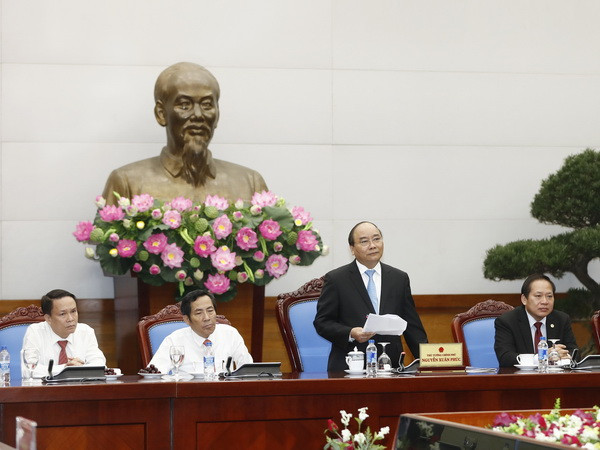 Thủ tướng Nguyễn Xuân Phúc phát biểu. (Ảnh: Thống Nhất/TTXVN ) Báo chí chú trọng tuyên truyền cải thiện môi trường đầu tư kinh doanh ảnh 1