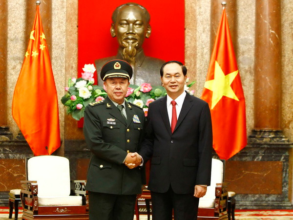 Chủ tịch nước Trần Đại Quang tiếp Thượng tướng Phạm Trường Long, Ủy viên Bộ Chính trị, Phó Chủ tịch Quân ủy Trung ương Trung Quốc. (Ảnh: An Đăng/TTXVN ) Chủ tịch nước tiếp Phó Chủ tịch Quân ủy Trung ương Trung Quốc ảnh 1