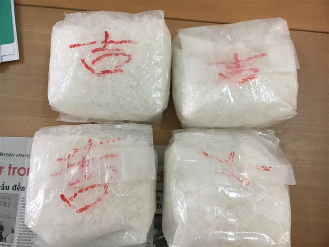 Bắt quả tang ba đối tượng vận chuyển trái phép hơn 10kg ma túy ảnh 1