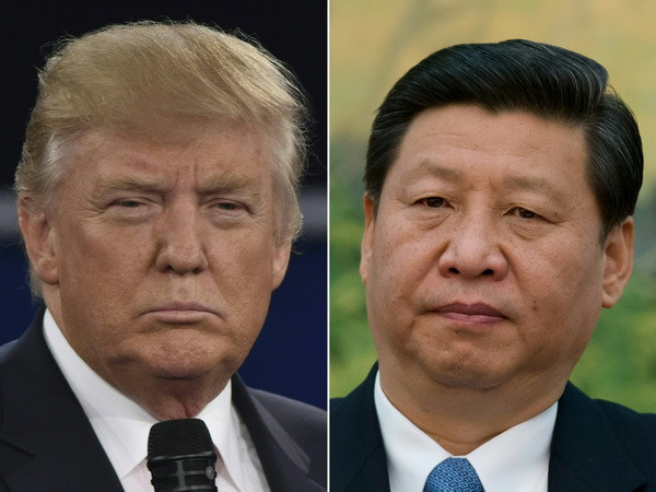 Tổng thống Mỹ Donald Trump (trái) và Chủ tịch Trung Quốc Tập Cận Bình (phải). (Nguồn: AFP/TTXVN) Dấu hiệu tích cực đối với căng thẳng thương mại Mỹ-Trung ảnh 1