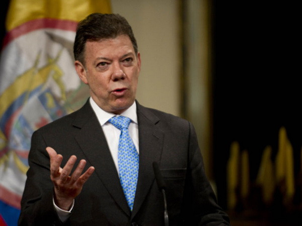 Lãnh đạo Colombia kêu gọi dân ủng hộ hòa đàm với FARC ảnh 1