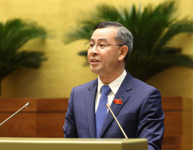 Tổng Kiểm toán Nhà nước Ngô Văn Tuấn trình bày Báo cáo kiểm toán quyết toán ngân sách nhà nước năm 2022. (Ảnh: Phương Hoa /TTXVN) ttxvn_tong kiem toan Nha nuoc.jpg