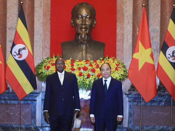 Chủ tịch nước Nguyễn Xuân Phúc hội đàm với Tổng thống Cộng hòa Uganda ảnh 1