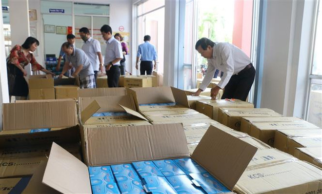Chuyển giao gần 230.000 khẩu trang y tế phục vụ phòng, chống dịch ảnh 1