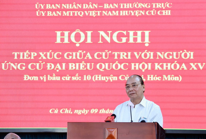 Chủ tịch nước Nguyễn Xuân Phúc tiếp xúc cử tri Thành phố Hồ Chí Minh ảnh 1