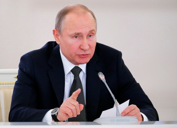 Tổng thống Nga Vladimir Putin. (Ảnh: AFP/TTXVN) Nga kịch liệt lên án hành động tấn công một nhà nước có chủ quyền ảnh 1