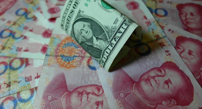 Chỉ riêng trong tháng Ba vừa qua, Trung Quốc đã bán 20 tỷ USD trái phiếu chính phủ Mỹ. (Nguồn: AFP) Kinh tế Mỹ ra sao nếu Trung Quốc bán phá giá trái phiếu kho bạc Mỹ ảnh 1