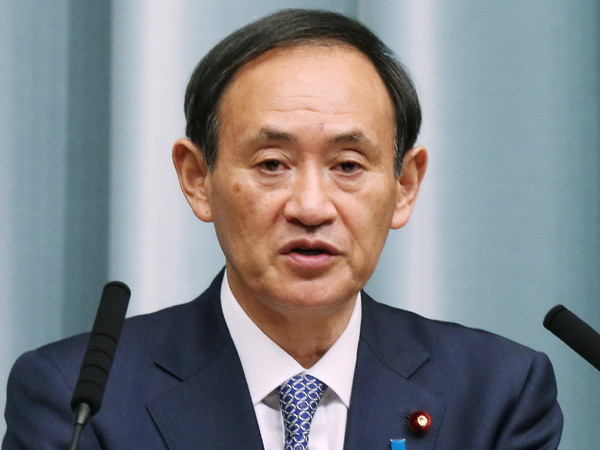 Chánh văn phòng Nội các Nhật Bản Yoshihide Suga. (Nguồn: AFP/TTXVN) Nhật Bản nêu điều kiện nới lỏng trừng phạt Triều Tiên ảnh 1