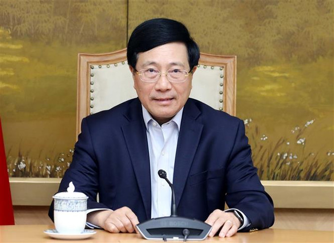 Phó Thủ tướng Chính phủ Phạm Bình Minh làm Tổ trưởng Tổ công tác về rà soát, tháo gỡ khó khăn, vướng mắc và thúc đẩy thực hiện dự án đầu tư. (Ảnh: Phạm Kiên/TTXVN) Thành lập Tổ công tác đặc biệt tháo gỡ vướng mắc dự án đầu tư ảnh 1
