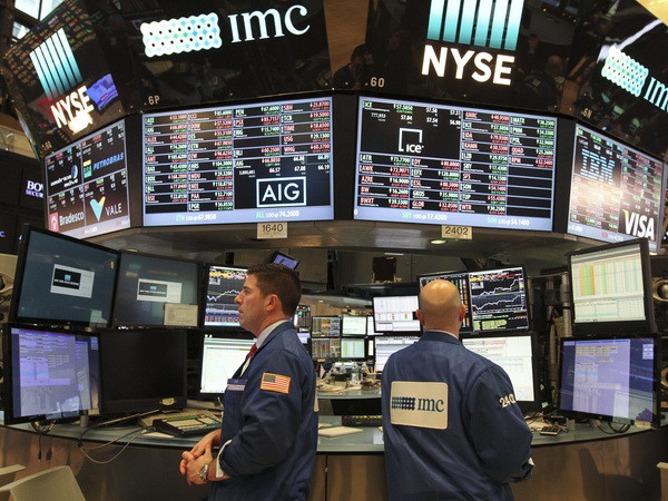 Chứng khoán Phố Wall bừng sáng sau cam kết của Tổng thống Trump ảnh 1