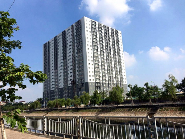 Dự án nhà ở xã hội Đồng Mồ-Đại Kim (quận Hoàng Mai, Hà Nội) vừa hoàn thành, đưa vào sử dụng, góp phần giải quyết chỗ ở cho hàng nghìn người dân thu nhập thấp. (Ảnh: Minh Nghĩa/TTXVN) Thu hút đầu tư nhà ở xã hội: Chỉ hấp dẫn khi có vốn và đất sạch ảnh 1