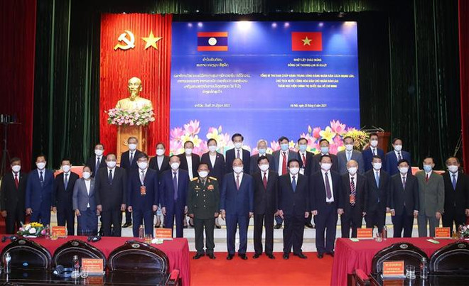 Tổng Bí thư, Chủ tịch nước Lào thăm Học viện Chính trị QG Hồ Chí Minh ảnh 1