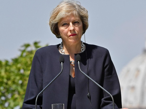Thủ tướng May: Kinh tế Anh tiếp tục bị tổn thương sau Brexit ảnh 1