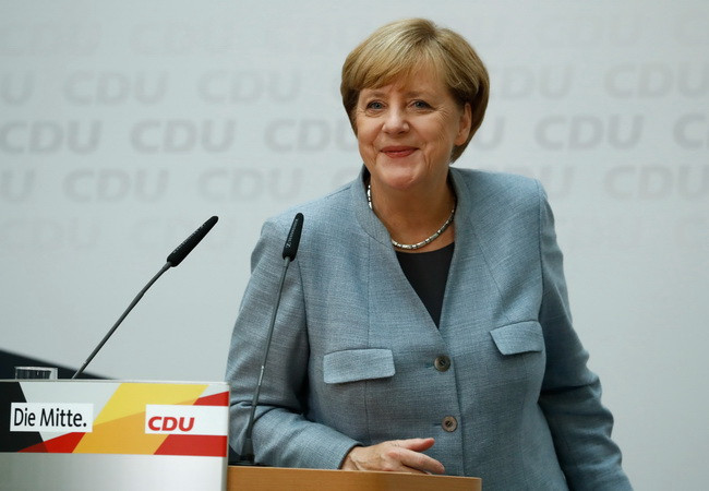 Bà Merkel công bố thời điểm đàm phán lập chính phủ liên minh ảnh 1