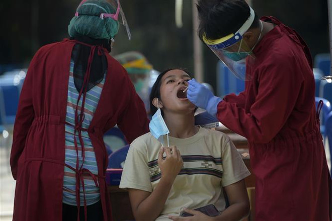 Số ca nhiễm mới tại Indonesia tăng lên mức cao nhất kể từ cuối tháng 2 ảnh 1