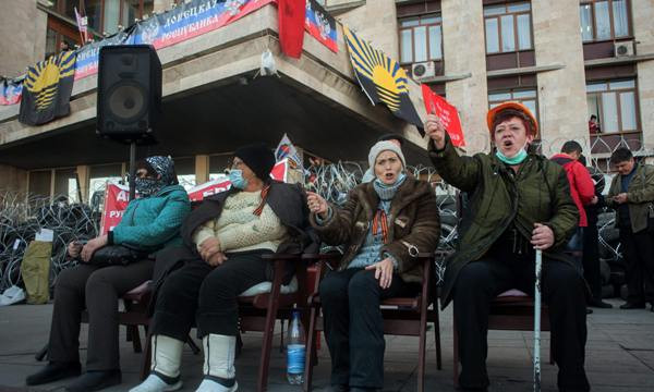Ukraine: Phe biểu tình ở Lugansk đã đặt thuốc nổ, bắt con tin ảnh 1