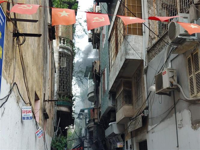 Mở lối thoát hiểm thứ 2 - Đường sống trong các vụ cháy nhà ống ảnh 1