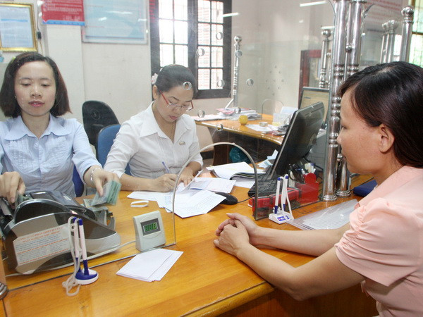 Ảnh chỉ có tính minh họa. (Ảnh: Trần Việt/TTXVN) Nghịch lý nỗi ngân hàng thừa tiền, doanh nghiệp thiếu vốn ảnh 1