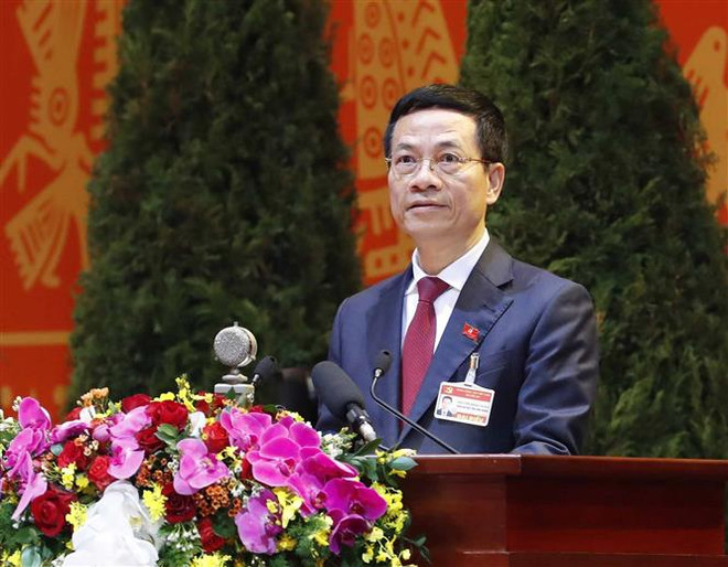 Đồng chí Nguyễn Mạnh Hùng, Ủy viên Trung ương Đảng, Bí thư Ban Cán sự Đảng, Bộ trưởng Bộ Thông tin và Truyền thông trình bày tham luận. (Ảnh: TTXVN) Phát triển mạnh mẽ khoa học, công nghệ, xây dựng Chính phủ điện tử ảnh 2