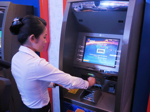 Ứng phó với “căn bệnh” ATM quá tải mỗi dịp Tết đến Xuân về ảnh 1