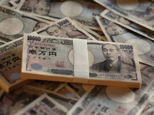 Đồng yen giảm giá sau khi BoJ hạ dự báo tăng trưởng, lạm phát ảnh 1