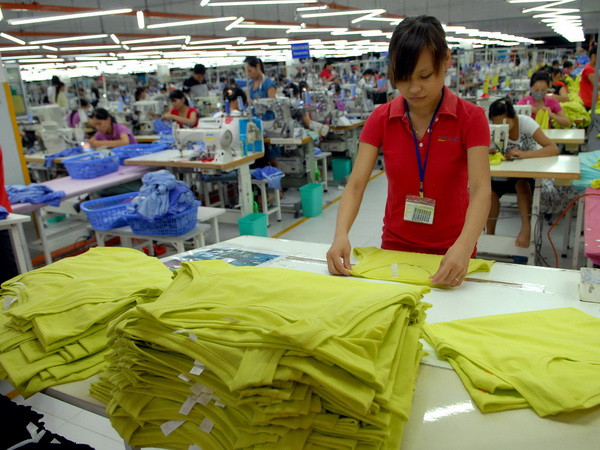 Việt Nam ứng phó với xu thế nhập siêu trở lại trong năm 2015 ảnh 1