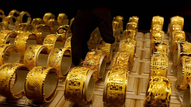 Giá vàng ghi nhận mức tăng gần 1% cả tuần. (Nguồn: moneycontrol.com) Giá vàng tăng gần 1% trong tuần qua do nhu cầu ''trú ẩn an toàn'' ảnh 1
