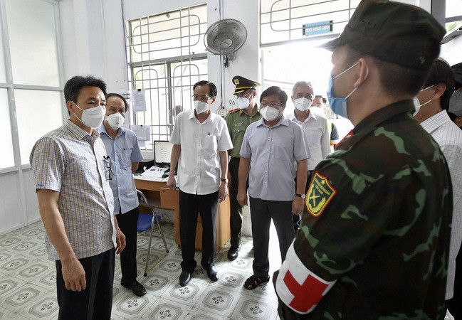 PTT Vũ Đức Đam: Cố gắng tiêm 100% để đạt miễn dịch cộng đồng sớm nhất ảnh 1