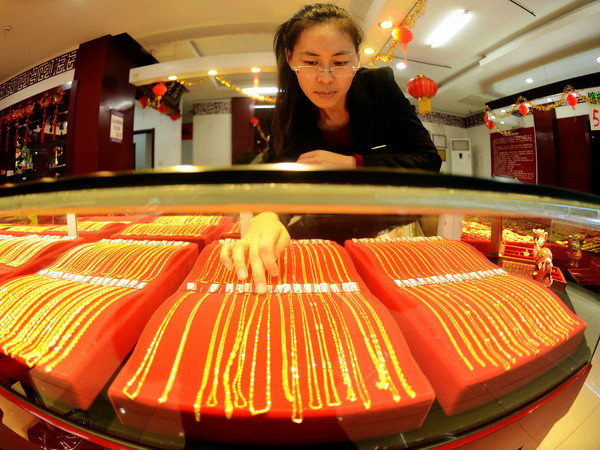 Giá vàng châu Á tăng lên mức cao nhất trong hơn một tuần ảnh 1