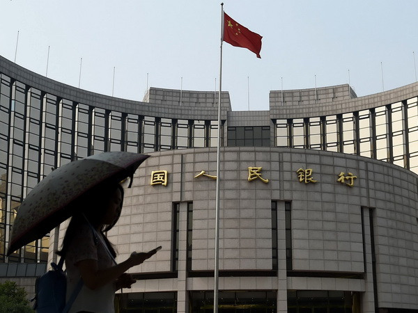 Ngân hàng Nhân dân Trung Quốc hạ lãi suất cho vay còn gần một nửa ảnh 1