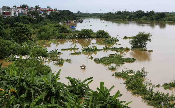 Mực nước trên sông Hồng tại Hà Nội sẽ đạt đỉnh vào trưa nay ảnh 1