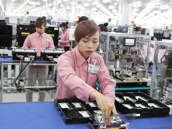 Điện thoại, dệt may và da giày đứng đầu nhóm hàng xuất siêu ảnh 1