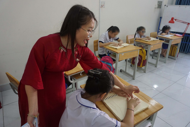 ttxvn_co giao khuyet tat1.jpg