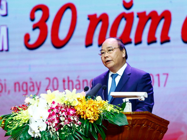 Vinh danh 30 tập thể, cá nhân xuất sắc trong công cuộc đổi mới ảnh 1