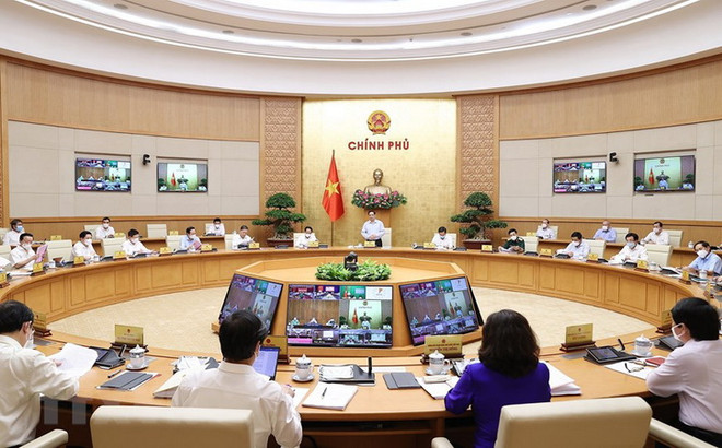 Quang cảnh phiên họp. (Ảnh: Dương Giang/TTXVN) Nghị quyết phiên họp Chính phủ trực tuyến với các địa phương về KTXH ảnh 1