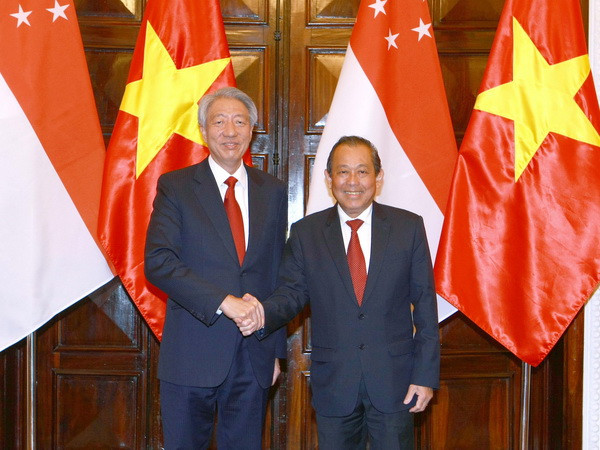 Phó Thủ tướng Trương Hòa Bình hội đàm Phó Thủ tướng Singapore ảnh 1