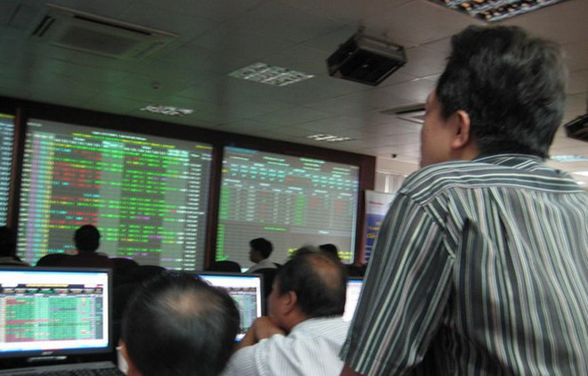 Thị trường chứng khoán tháng Ba: Tích lũy quanh mốc 1.200 điểm ảnh 1