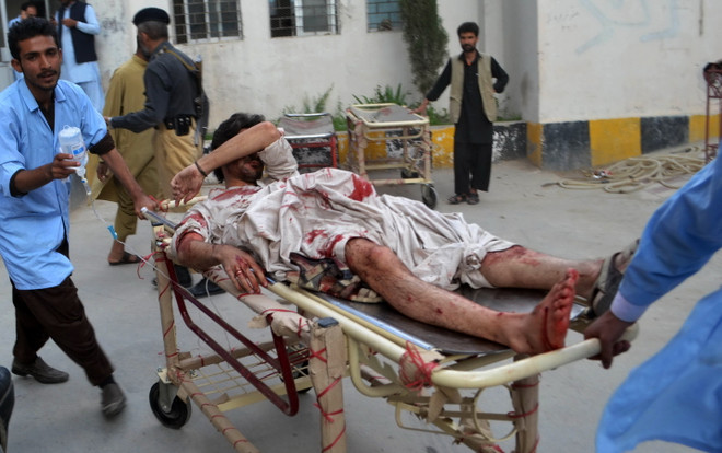 [Photo] Đánh bom ở Pakistan làm 18 người thương vong ảnh 2
