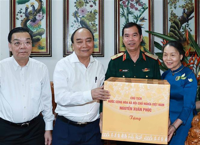 Chủ tịch nước thăm, tặng quà các gia đình chính sách tại Hà Nội ảnh 1