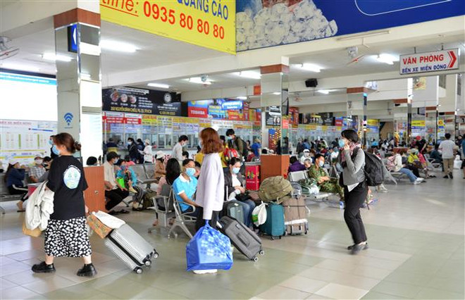 Người dân rời Thành phố Hồ Chí Minh bắt đầu kỳ nghỉ lễ. Ảnh minh họa. (Ảnh: Tiến Lực/TTXVN) TP.HCM: Người dân dồn về các bến xe, nhà ga khiến nhiều điểm bị ùn ứ ảnh 1