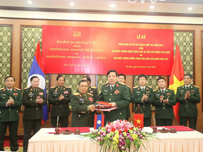 Bộ Quốc phòng Việt-Lào ký Nghị định thư và Kế hoạch hợp tác 2015 ảnh 1