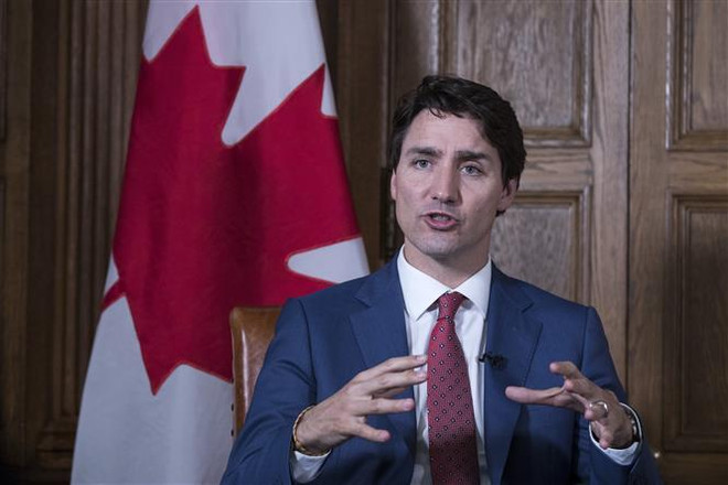 Thủ tướng Canada Justin Trudeau phát biểu với báo giới tại Ottawa, Ontario. (Ảnh: AFP/TTXVN) Thủ tướng Canada Justin Trudeau khởi động chiến dịch tranh cử ảnh 1