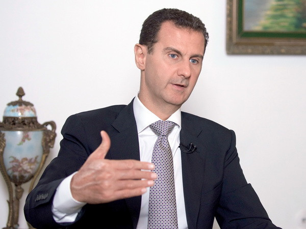Tổng thống Assad: "Nga không yêu cầu tôi là một tổng thống bù nhìn" ảnh 1