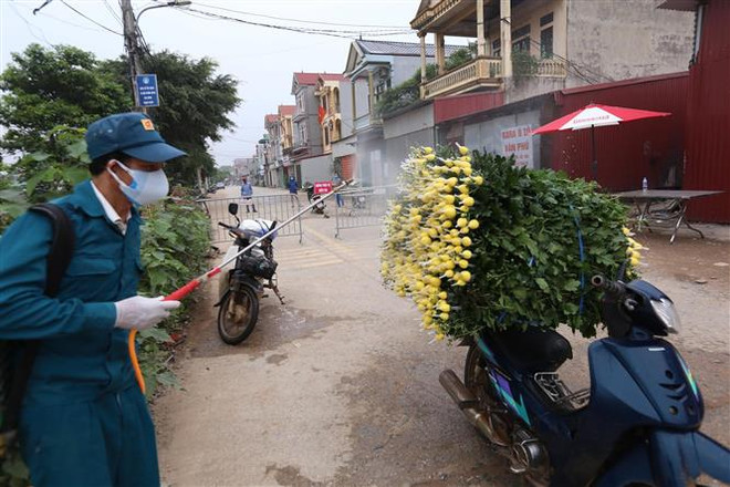 Hà Nội: Tập trung rà soát những người liên quan đến ổ dịch ở Hạ Lôi ảnh 2