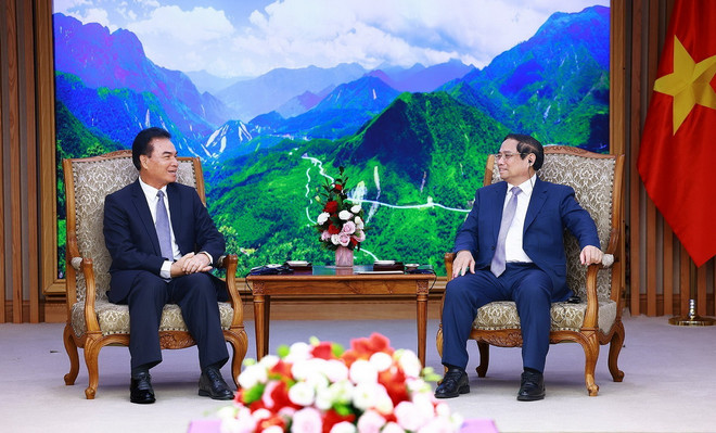 Thủ tướng Phạm Minh Chính tiếp ông Phet Phomphiphak, Bộ trưởng Bộ Kế hoạch và Đầu tư Lào, Chủ tịch Ủy ban hợp tác Lào-Việt Nam. (Ảnh: Dương Giang/TTXVN) ttxvn_1908_pham minh chinh lao (2).jpg