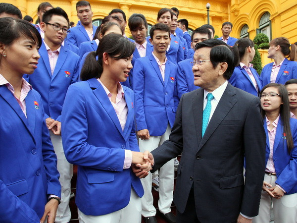 Chủ tịch nước gặp mặt đoàn thể thao Việt Nam dự SEA Games ảnh 1