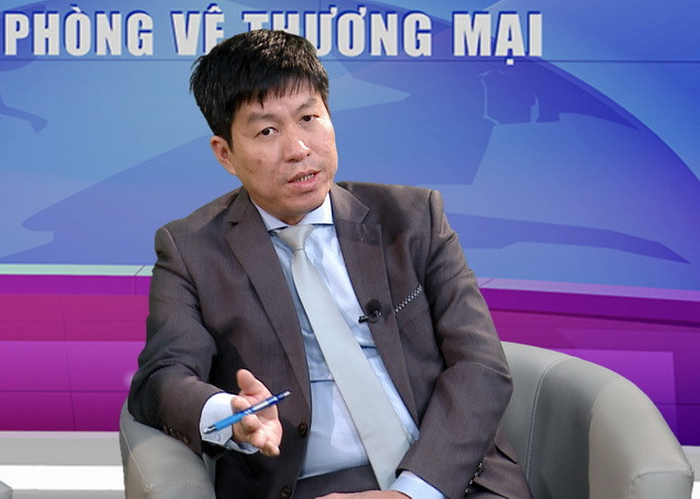 Phó Cục trưởng Cục Phòng vệ Thương mại, Bộ Công thương Chu Thắng Trung. (Ảnh: TTXVN phát) Giải pháp hạn chế điều tra phòng vệ thương mại với hàng hóa xuất khẩu ảnh 1