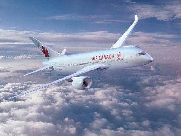 Air Canada thu phí từ túi hành lý đầu gửi trên một số chuyến bay ảnh 1